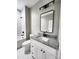 Modern bathroom with a white vanity, granite countertop, and a tiled shower/tub at 1247 Beltline Rd # 1, Chester, SC 29706