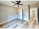 Bright bedroom features a ceiling fan, wood-look floors, and neutral walls at 1247 Beltline Rd # 1, Chester, SC 29706