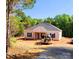 Charming single-story home with a symmetrical facade, dark shutters, and a well-manicured lawn at 1247 Beltline Rd # 1, Chester, SC 29706
