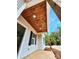 Inviting covered front porch with a stained wood ceiling, providing a warm welcome to this charming home at 1247 Beltline Rd # 1, Chester, SC 29706