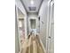 Hallway features wood-look flooring and leads to rooms with white trim doors at 1247 Beltline Rd # 1, Chester, SC 29706