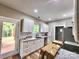 Modern kitchen with white cabinetry, granite countertops, and stainless steel appliances at 1247 Beltline Rd # 1, Chester, SC 29706
