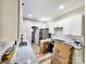 The contemporary kitchen has granite countertops and white cabinetry at 1247 Beltline Rd # 1, Chester, SC 29706