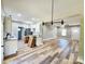 Open-concept living space featuring hardwood floors, recessed lights, and seamless flow to the kitchen at 1247 Beltline Rd # 1, Chester, SC 29706