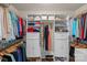 Walk-in closet with custom shelving and ample storage space for clothes, shoes, and accessories at 1400 Coachman Dr, Waxhaw, NC 28173