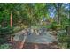 Inviting firepit area with seating and string lights, perfect for outdoor gatherings at 1400 Coachman Dr, Waxhaw, NC 28173