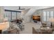 Spacious living area with built-in benches, many windows with shutters and cozy furniture at 1400 Coachman Dr, Waxhaw, NC 28173