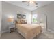 This spacious bedroom features a ceiling fan, and neutral decor at 1410 Smoketree Ct, Waxhaw, NC 28173