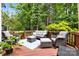 Cozy deck with plush outdoor seating, perfect for relaxing and entertaining at 14849 Middlesborough Dr, Matthews, NC 28104