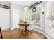 Cozy breakfast nook with natural light, a round table, and seating for four at 14849 Middlesborough Dr, Matthews, NC 28104