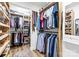 A spacious walk-in closet with custom shelving and ample storage space at 14849 Middlesborough Dr, Matthews, NC 28104
