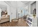 Spacious entryway features hardwood floors and views of the dining room and living room at 14849 Middlesborough Dr, Matthews, NC 28104
