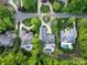 Aerial view of well-manicured homes with lush landscaping, mature trees, and private pools at 1504 Alydar Ct, Waxhaw, NC 28173