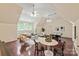 Bonus room with hardwood floors, ample seating, game table and a large window at 1504 Alydar Ct, Waxhaw, NC 28173