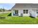 Backyard featuring a covered patio and green grass at 153 Jameson Park Dr # 4, Troutman, NC 28166