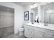 Bright bathroom with double sink vanity, large mirrors, and a walk-in closet at 153 Jameson Park Dr # 4, Troutman, NC 28166