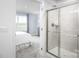 En-suite bathroom with glass-enclosed shower and views of the bedroom at 153 Jameson Park Dr # 4, Troutman, NC 28166