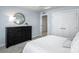 A light and bright bedroom with a large dresser at 153 Jameson Park Dr # 4, Troutman, NC 28166