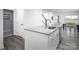 Bright open kitchen with granite counters, stainless steel appliances, and a view to the breakfast nook at 153 Jameson Park Dr # 4, Troutman, NC 28166