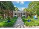 Charming bungalow with landscaped front yard and inviting walkway to the front porch at 1822 Hall Ave, Charlotte, NC 28205