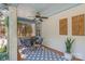 Cozy front porch with patterned tile flooring, a seating area, and decorative accents at 1822 Hall Ave, Charlotte, NC 28205