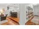 Inviting hallway adjacent to an open kitchen, complemented by stylish decor at 1822 Hall Ave, Charlotte, NC 28205