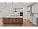 Modern kitchen with a large center island, stainless steel appliances, and sleek cabinetry at 2008 Waxhaw Crossing Dr, Waxhaw, NC 28205