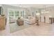 Open-concept living room and dining area with hardwood floors, ample natural light, and modern furnishings at 2008 Waxhaw Crossing Dr, Waxhaw, NC 28205