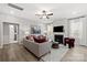 Cozy living room features a fireplace and plush furnishings for a comfortable atmosphere at 2010 Puddle Pond Rd, Indian Trail, NC 28079