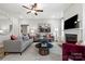 Comfortable living room with fireplace, modern decor, and ample seating at 2010 Puddle Pond Rd, Indian Trail, NC 28079