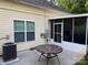 Backyard featuring a patio and the exterior of an enclosed porch at 2026 Talbot Ln, Hickory, NC 28602
