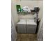 A laundry room that includes a washer, dryer, and shelving at 2026 Talbot Ln, Hickory, NC 28602