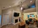 Cozy living room boasting a fireplace, vaulted ceiling, comfortable seating, and plenty of natural light at 2026 Talbot Ln, Hickory, NC 28602