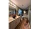 Bathroom featuring a double sink vanity, shower and tub at 204 Aspen Dr, Gastonia, NC 28052