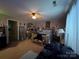 Comfortable bedroom featuring ample natural light and neutral color palette at 204 Aspen Dr, Gastonia, NC 28052