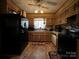 Traditional style kitchen features wooden cabinets and essential appliances at 204 Aspen Dr, Gastonia, NC 28052