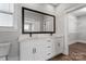 Bathroom with dual sink vanity, large framed mirror, black hardware and walk in closet at 2075 Fordhill St, Rock Hill, SC 29732