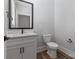 This bathroom features modern finishes and fixtures, wood flooring, and a clean aesthetic at 2075 Fordhill St, Rock Hill, SC 29732