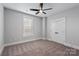 This bedroom features neutral walls, carpet flooring and a double door closet at 2075 Fordhill St, Rock Hill, SC 29732