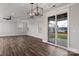 Open living room featuring hardwood floors, neutral walls, sliding doors, recessed lighting, and ceiling fan at 2075 Fordhill St, Rock Hill, SC 29732
