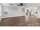 Spacious living room with wood floors, white trim, and sliding glass doors that lead to an outdoor living space at 2075 Fordhill St, Rock Hill, SC 29732