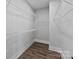 Walk in closet with wall to wall shelving and hardwood floors at 2075 Fordhill St, Rock Hill, SC 29732