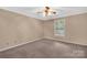 Bedroom featuring carpeted floors, neutral walls, and a window providing natural light at 212 Pointe Cir, Rock Hill, SC 29732