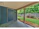 Covered patio offering outdoor living with a view of the grassy backyard and fenced perimeter at 212 Pointe Cir, Rock Hill, SC 29732