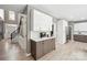 Spacious kitchen with modern cabinets, white countertops, and staircase visible in this open floor plan at 21203 Harken Dr, Cornelius, NC 28031