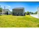 Back exterior view showcasing a spacious lawn, perfect for outdoor activities and gatherings at 217 Hydrangea Dr, Clover, SC 29710