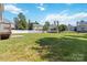 Fenced backyard featuring ample green space and mature trees at 217 Hydrangea Dr, Clover, SC 29710