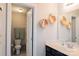 Bathroom featuring a toilet, sink and decorative hexagon wall decor at 217 Hydrangea Dr, Clover, SC 29710