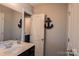 Bathroom featuring a granite countertop vanity with wall decor at 217 Hydrangea Dr, Clover, SC 29710