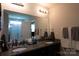 Bathroom featuring double sinks, granite countertop, and large mirror at 217 Hydrangea Dr, Clover, SC 29710